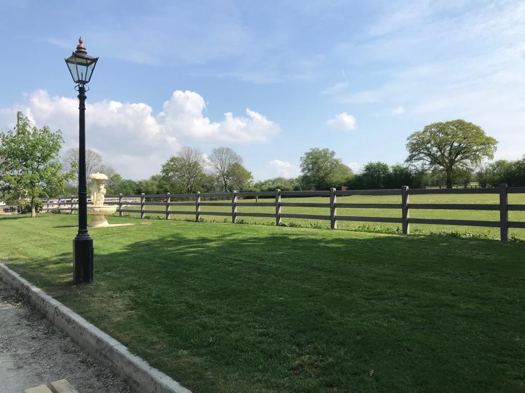Finished timber-effect precast concrete fencing