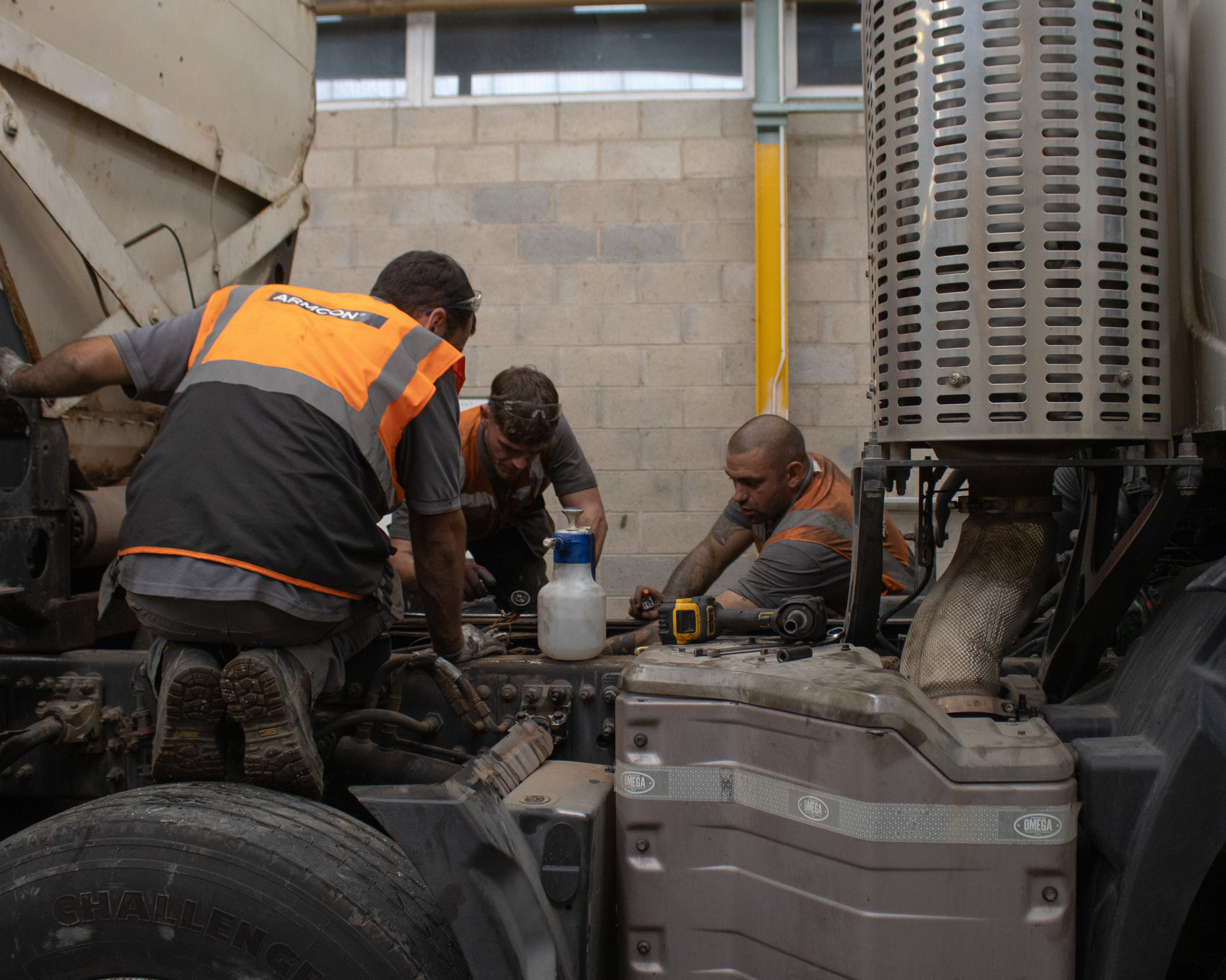 Armcon engineer working on a volumetric concrete mixer